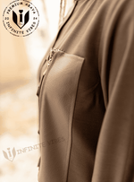 Close-up of premium abaya with textured pocket and zipper, modest fashion for women