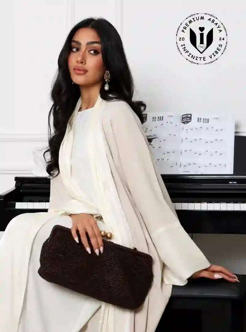 Chic_beige_and_white_abaya_dress_for_formal_events_Ramadan_or_Eid_fashion_look_