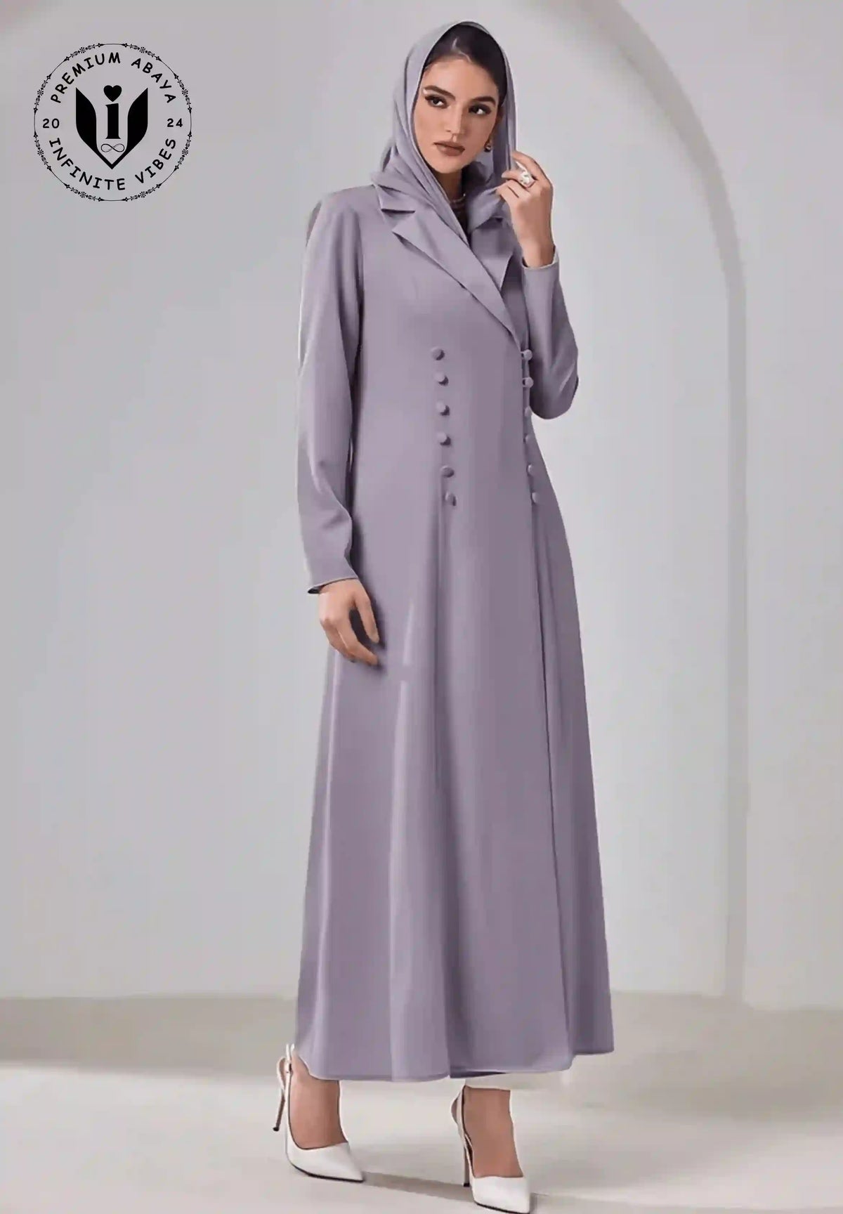 Elegant woman in a lavender buttoned abaya with hood, modest fashion, UAE style