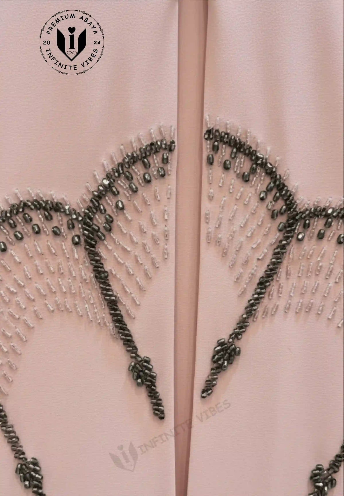 Luxury_blush_pink_embroidered_abaya_for_women_with_premium_fabric_elegant_Dubai_style_modest_wear_infinite_vibes