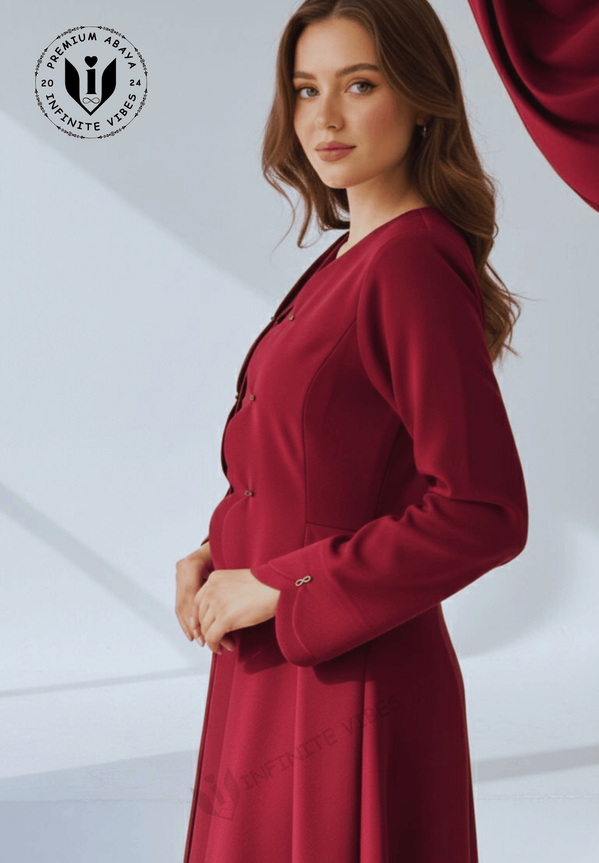 Maroon abaya side profile showing cascading ruffle detail and button cuff sleeves - premium Korean fabric modest wear UAE