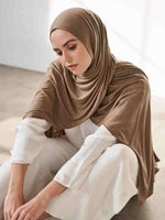 Stylish and breathable hijab in soft pastel colors, ideal for everyday wear in Dubai, UAE."