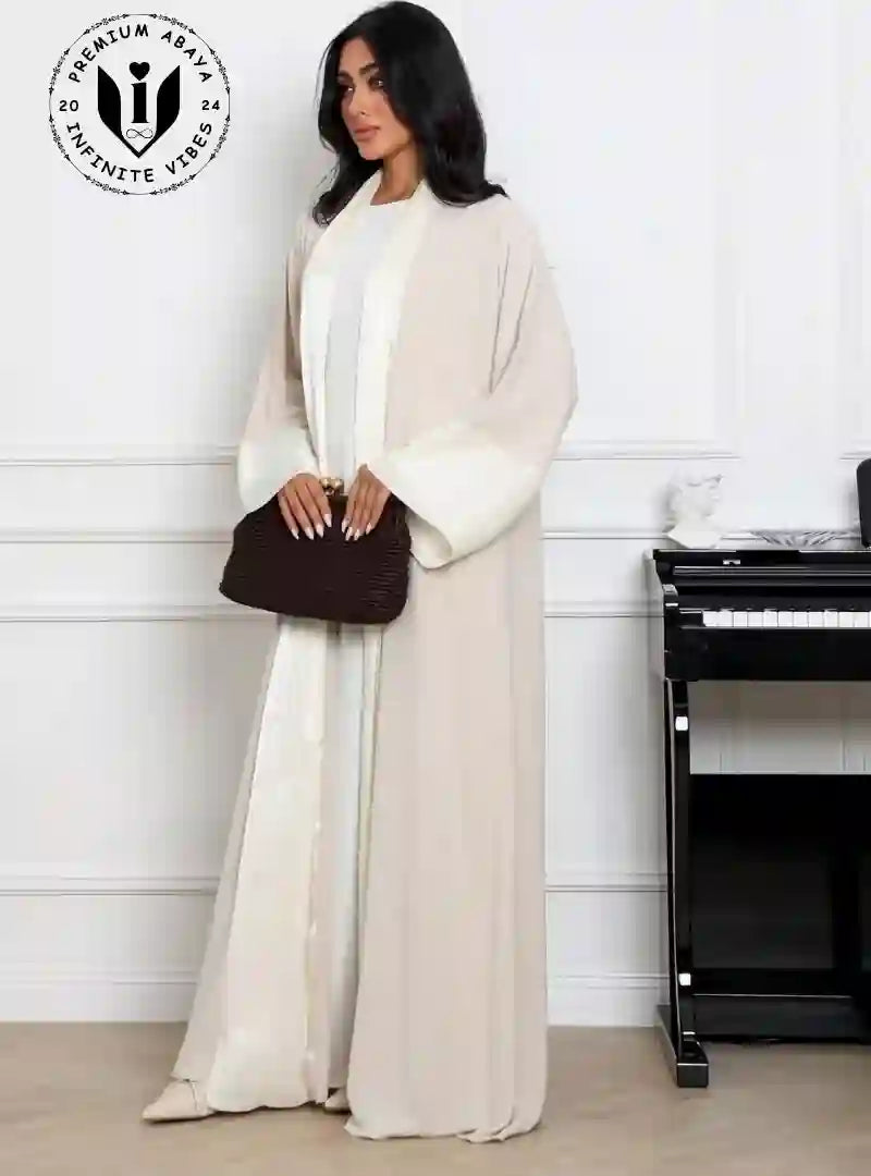 Stylish_Muslim_woman_wearing_luxury_abaya_with_clutch_and_heels_for_evening_wear