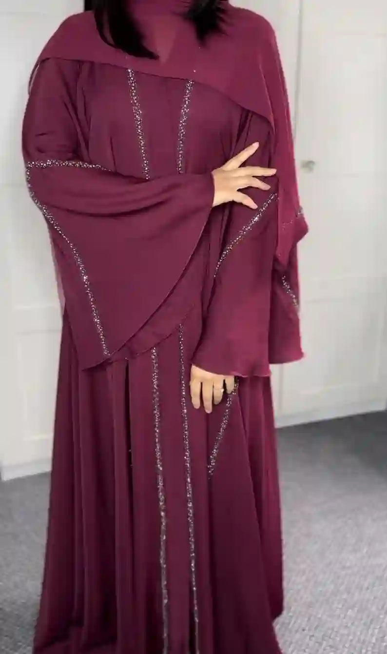 Elegant maroon embellished abaya with flared sleeves and sparkling trim detailing