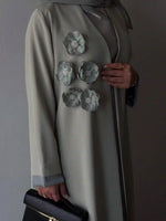 Premium embroidered abaya with floral appliqué, modest fashion for women in UAE