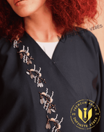 Elegant black abaya with beaded floral embroidery, premium modest fashion in UAE.