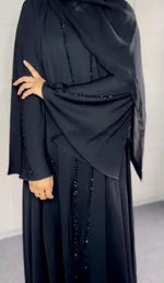 Black umbrella abaya with beaded detailing, modest fashion for women, 2025 design