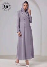 Elegant woman in a lavender buttoned abaya with hood, modest fashion, UAE style